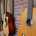 which is better for beginners acoustic or electric guitar